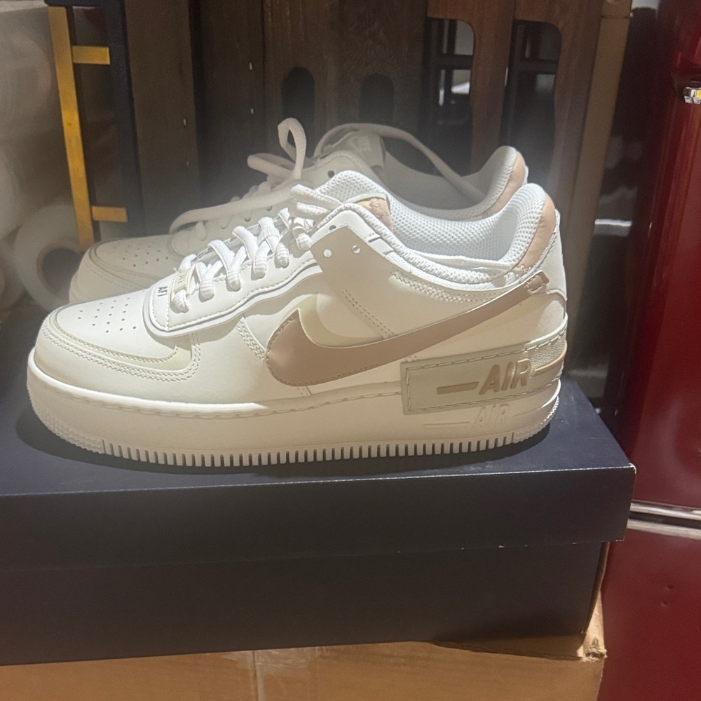 Nike Air Force 1 Low White and Gold Sneakers